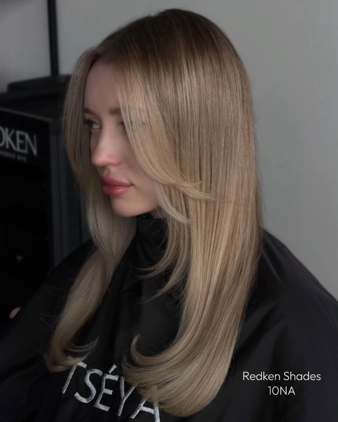 fall blonde hair colour 2026 Silky Vanilla Blonde with Elegant Curtain Layers