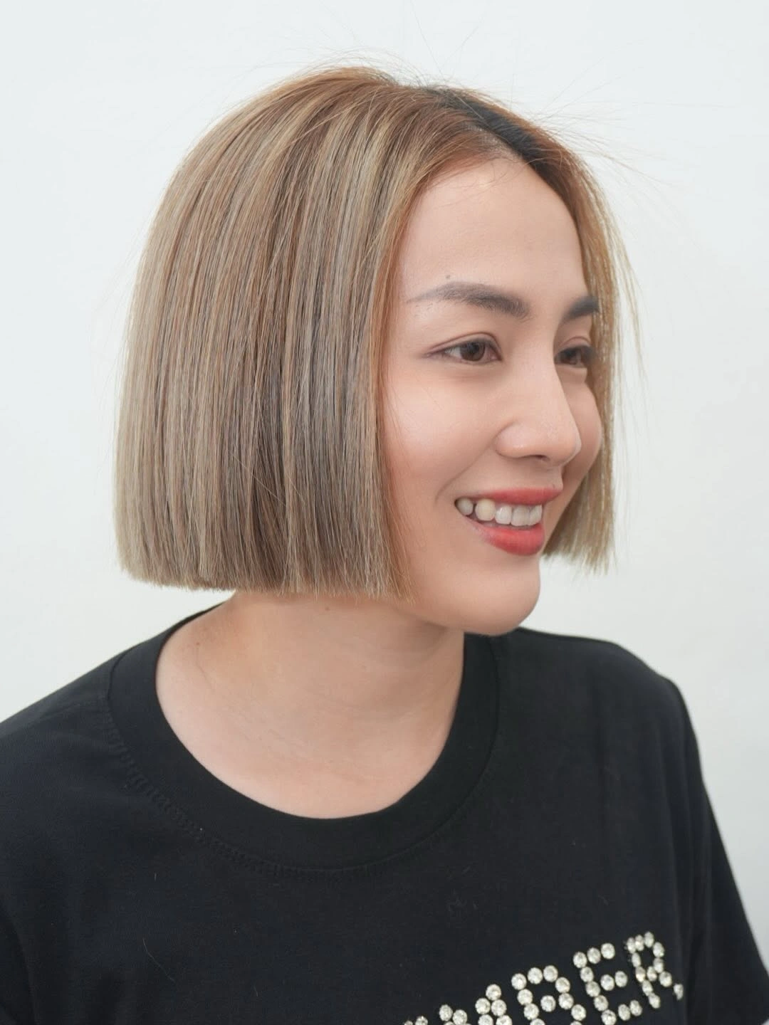 fall bob haircut ideas 2026 Soft Mushroom Blonde Bob With Effortless Precision