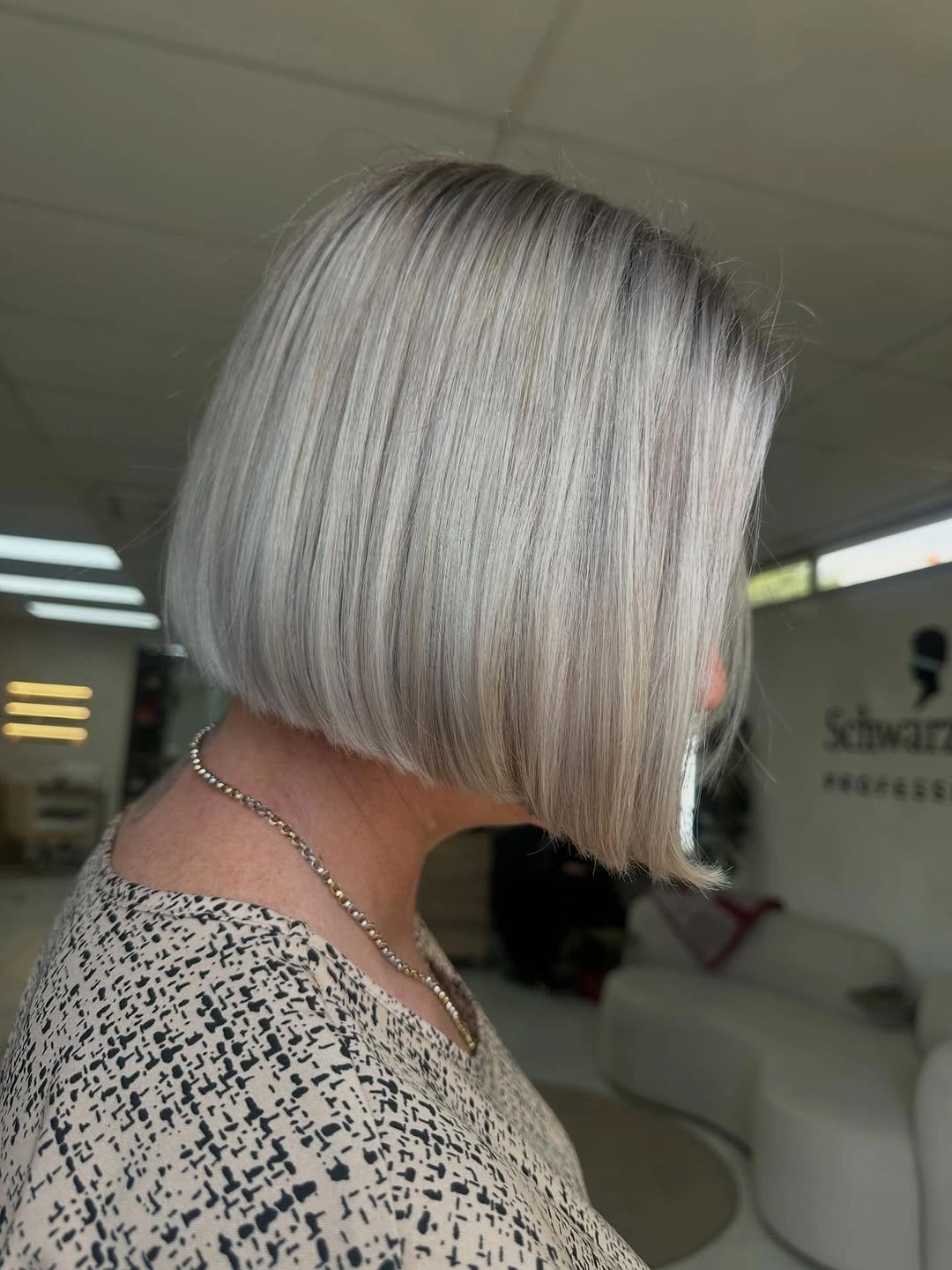 fall bob haircut ideas 2026 Glossy Platinum Bob That Looks Like Liquid Glass