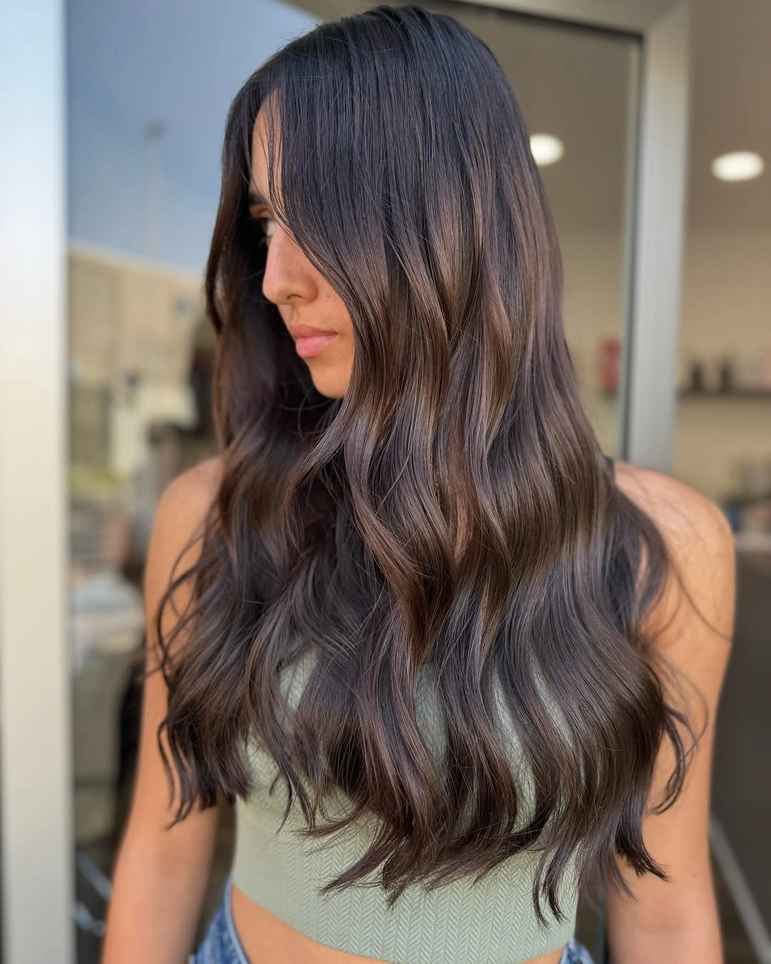 Fall brunette hair colour 2026 Glossy Espresso Brunette With Soft Face-Framing Light