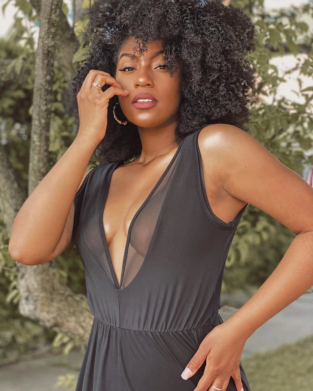fall hair colors for black women 2026 Soft Natural Volume with Timeless Ebony Depth