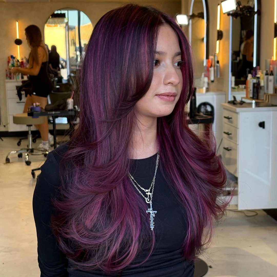 fall hair colour ideas 2026 Deep Blackberry Layers With Soft Face-Framing Movement