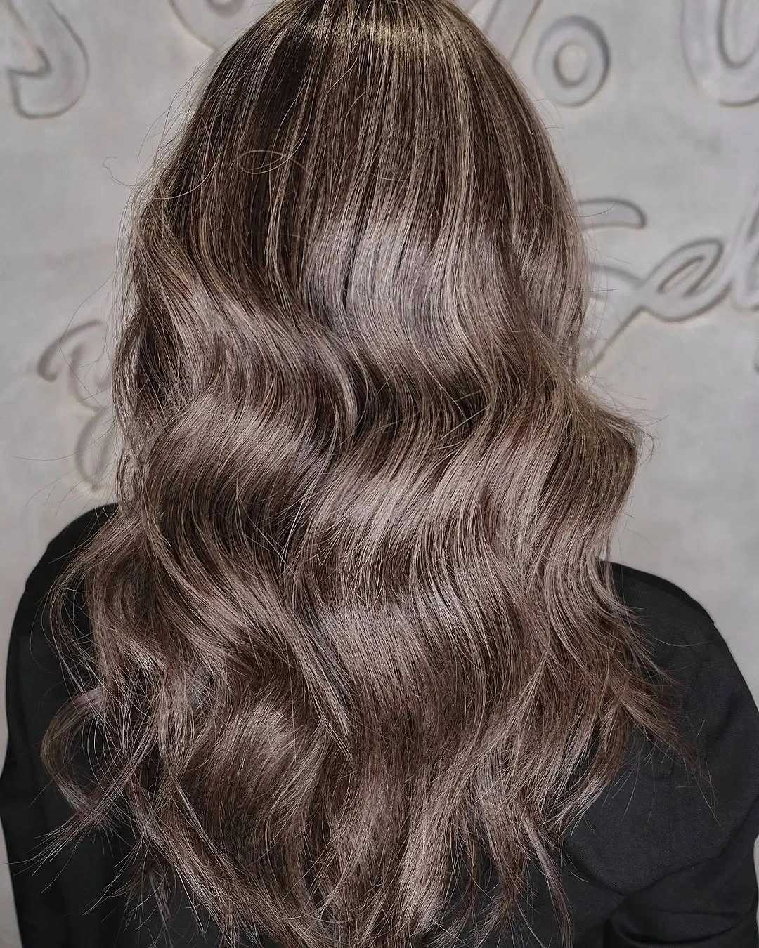 fall haircuts for women 2026 Cool Mushroom Brown Waves with a Velvet Finish