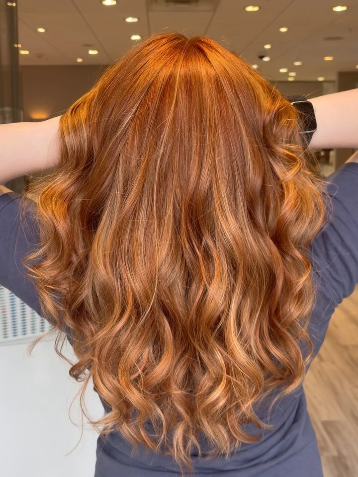 fall haircuts for women 2026 Warm Copper Waves That Capture Autumn Light