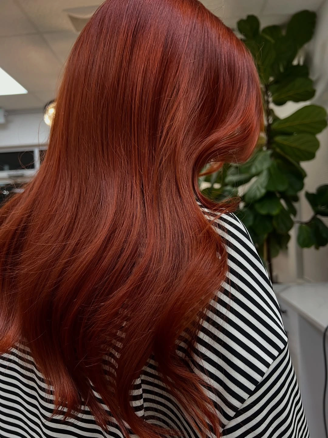 fall haircuts for women 2026 Glossy Cinnamon Copper with Soft Flowing Layers