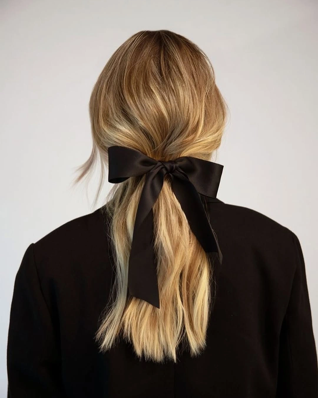 fall hairstyles 2026 Classic Black Ribbon Ponytail With Timeless Elegance
