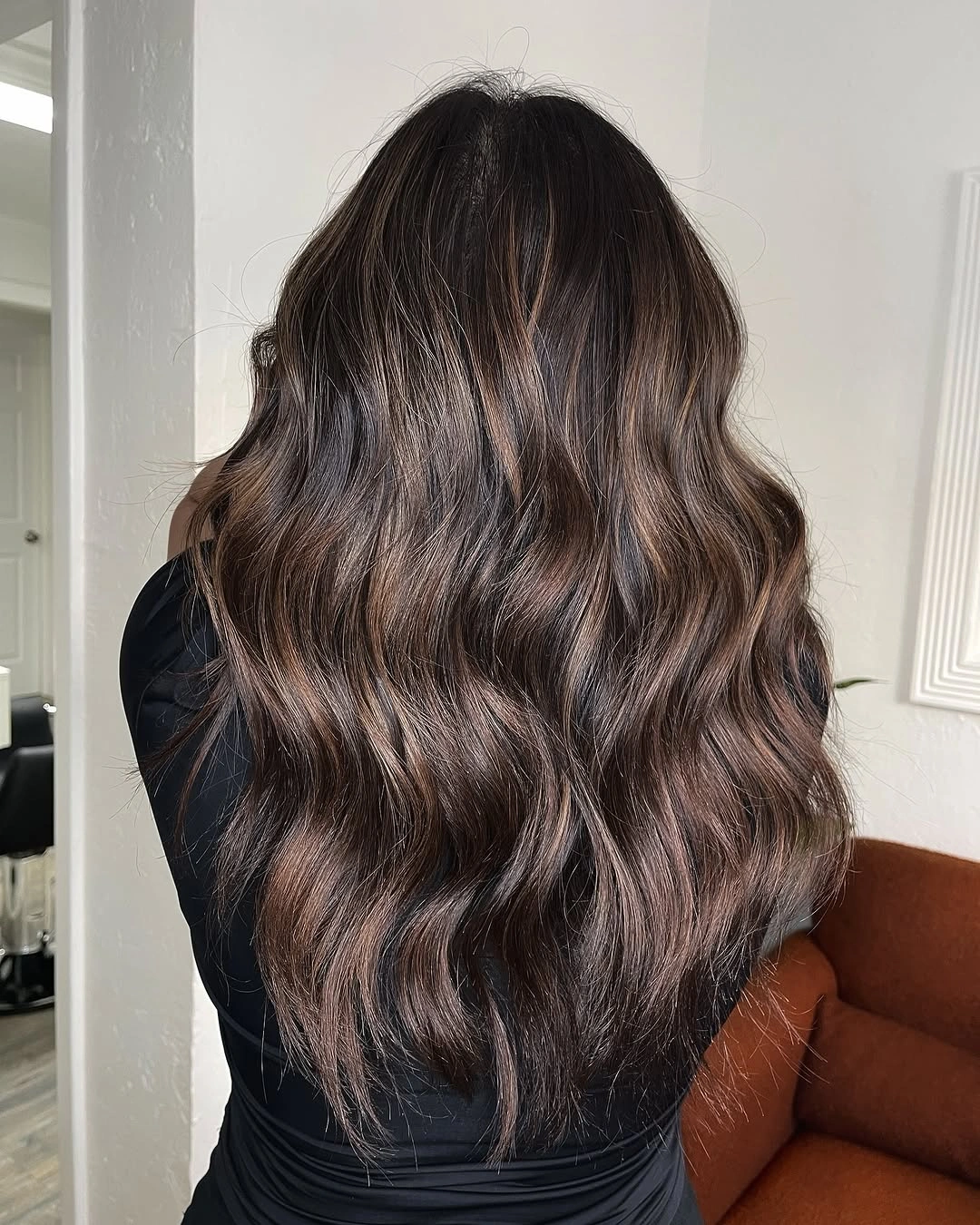 fall hairstyles 2026 Glossy Chocolate Waves That Never Go Out of Style