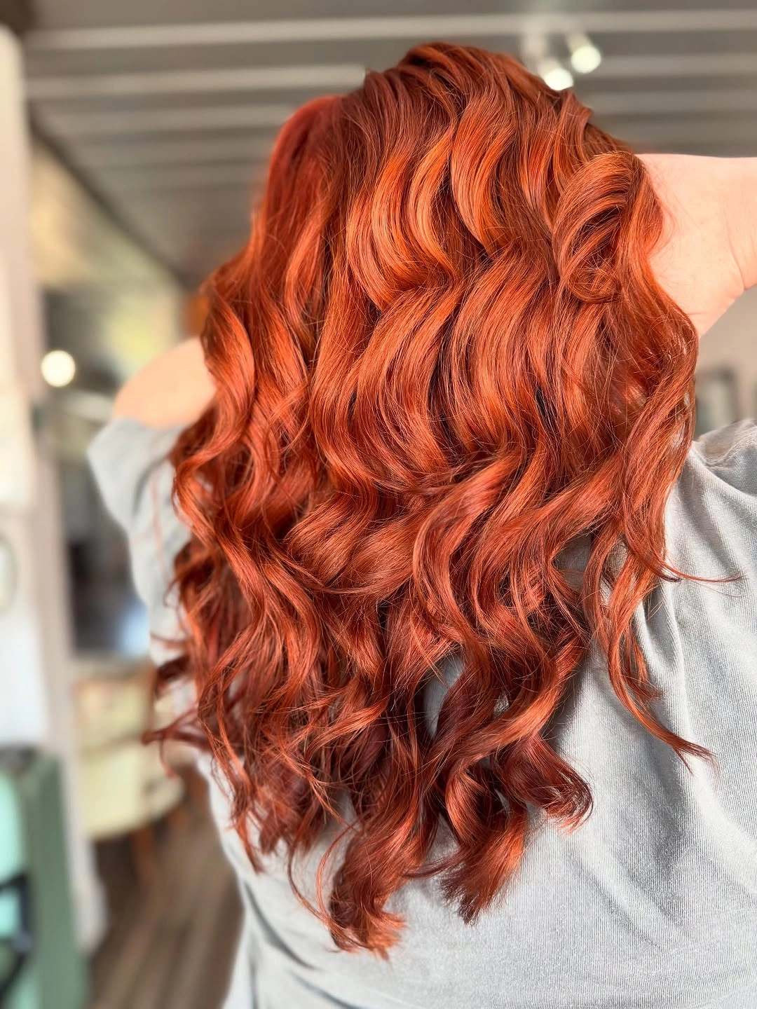 fall hairstyles for long hair 2026 Glossy Copper Waves That Glow With Every Autumn Sunset