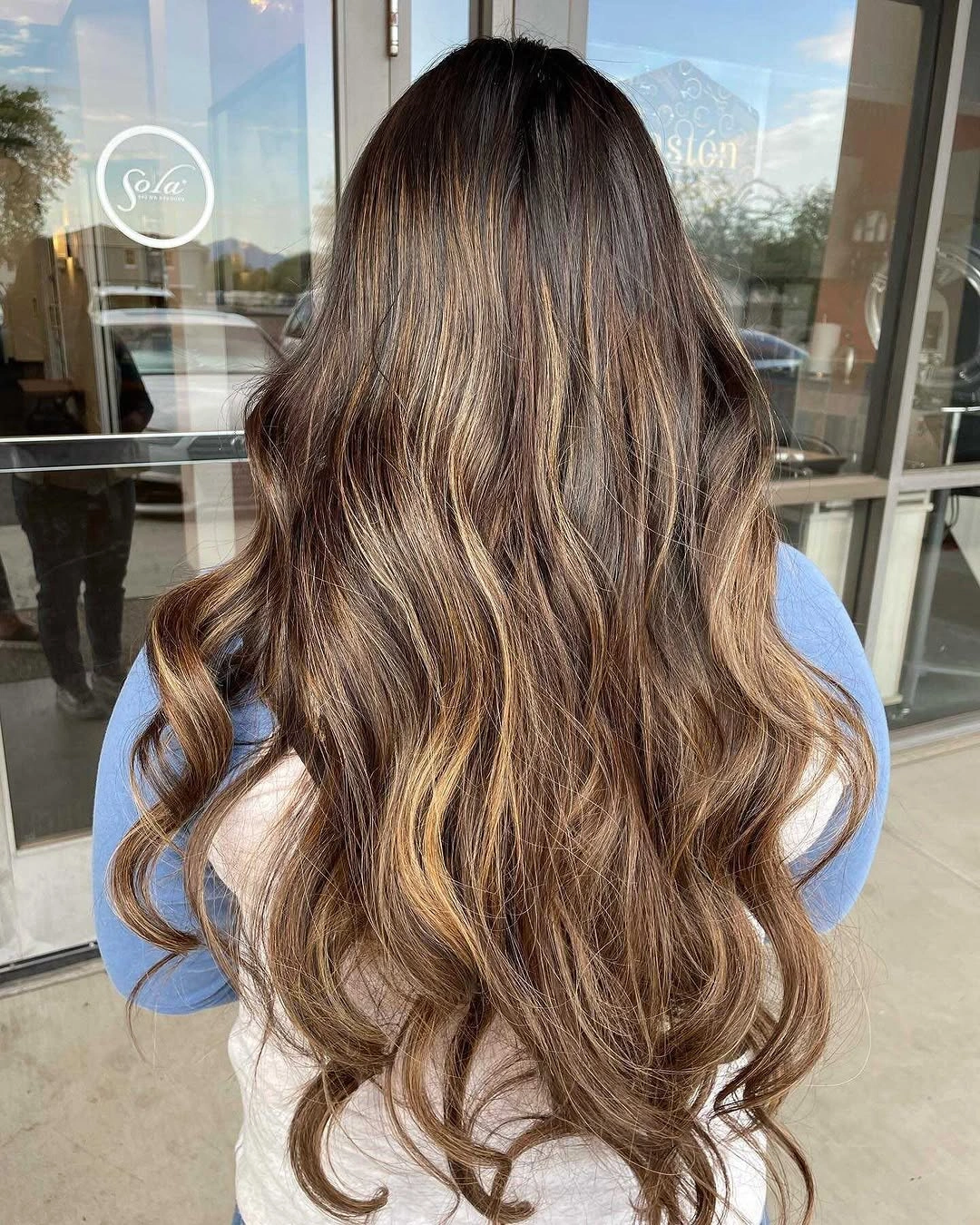 fall hairstyles for long hair 2026 Warm Caramel Balayage With Effortless Beach Waves