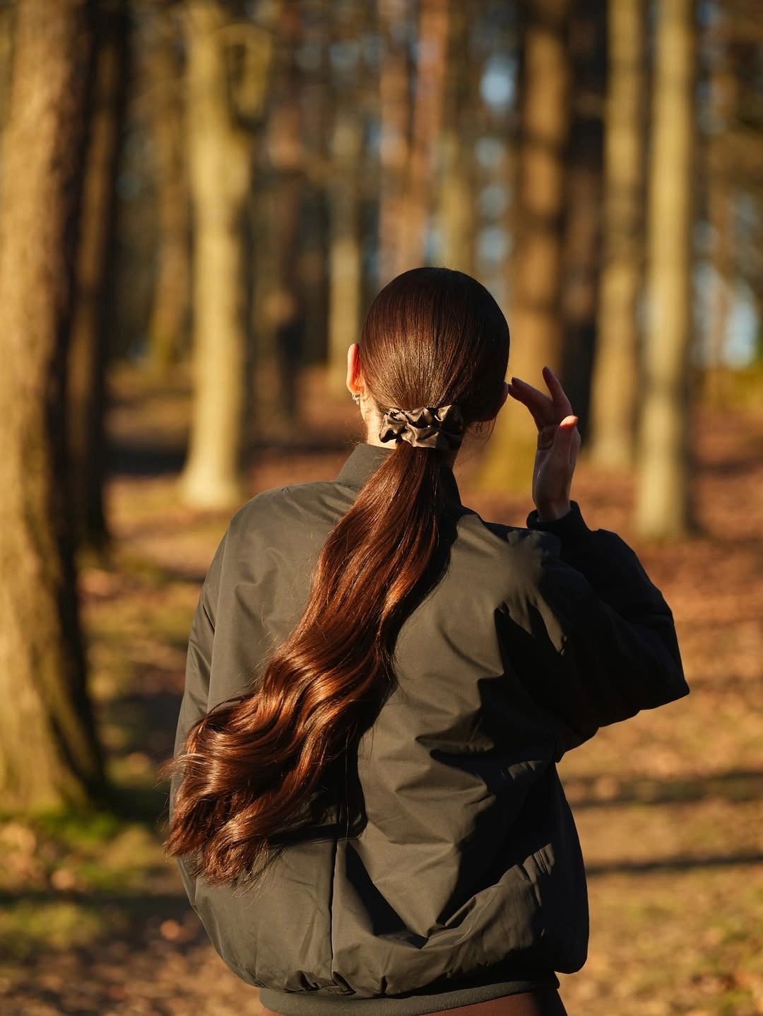 fall hairstyles for long hair 2026 Low Ponytail With Soft Waves for Everyday Elegance