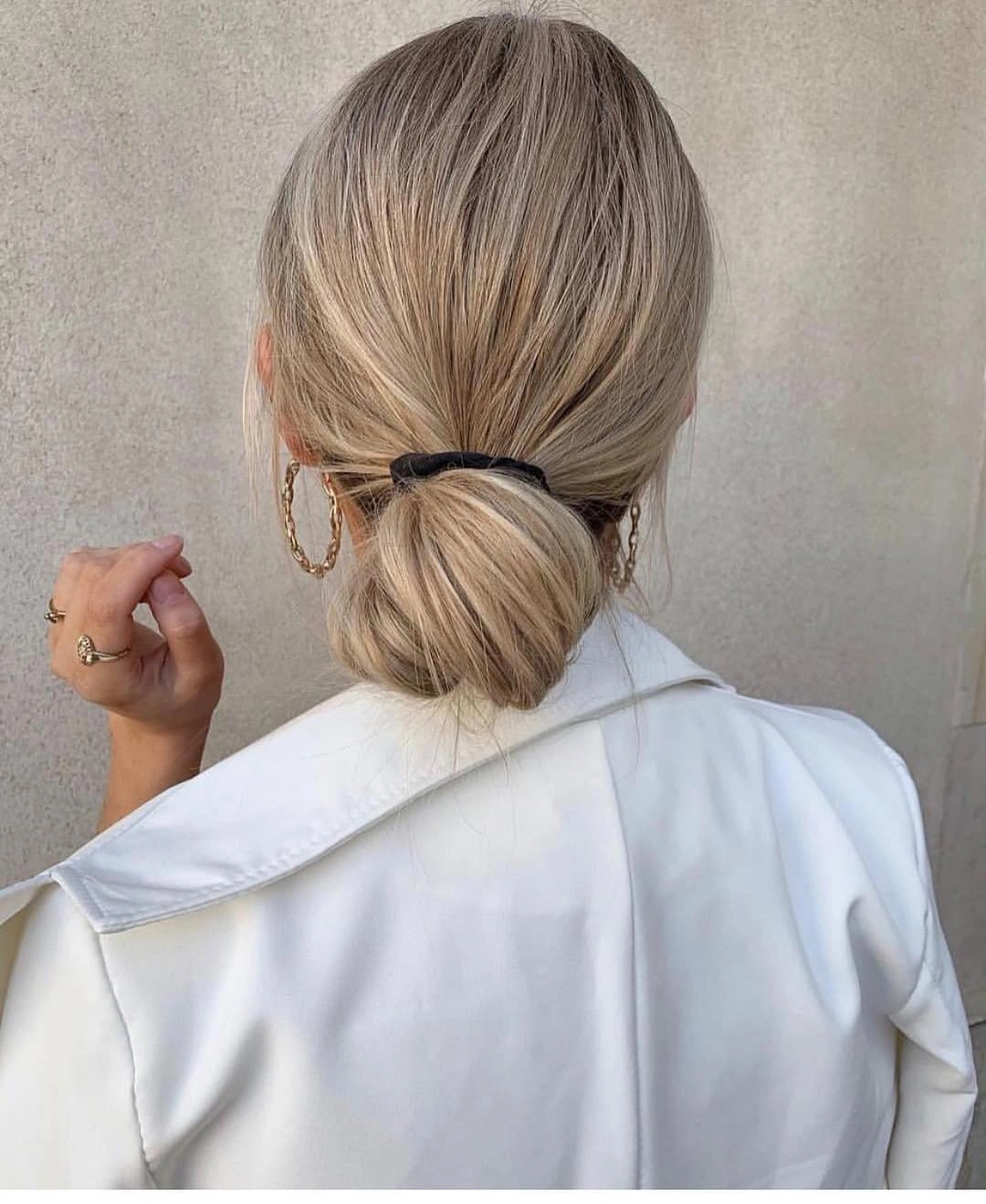 Fall hairstyles for office 2026 Minimalist Low Loop Bun for Busy Office Mornings