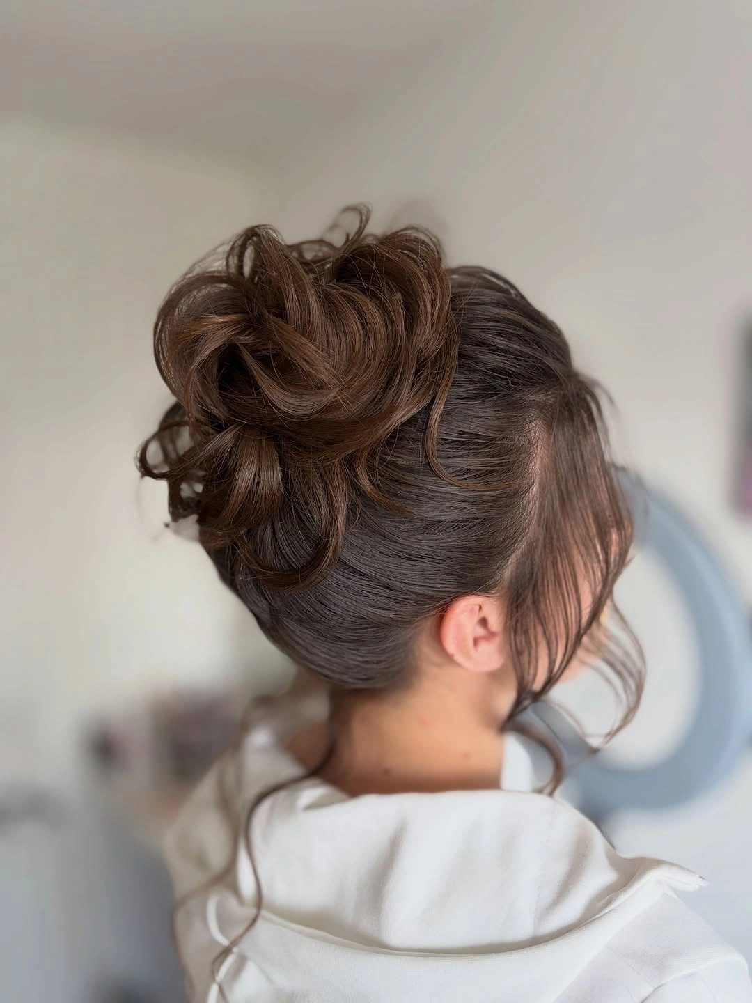 Fall hairstyles for office 2026 Elegant Voluminous Updo for Important Office Events