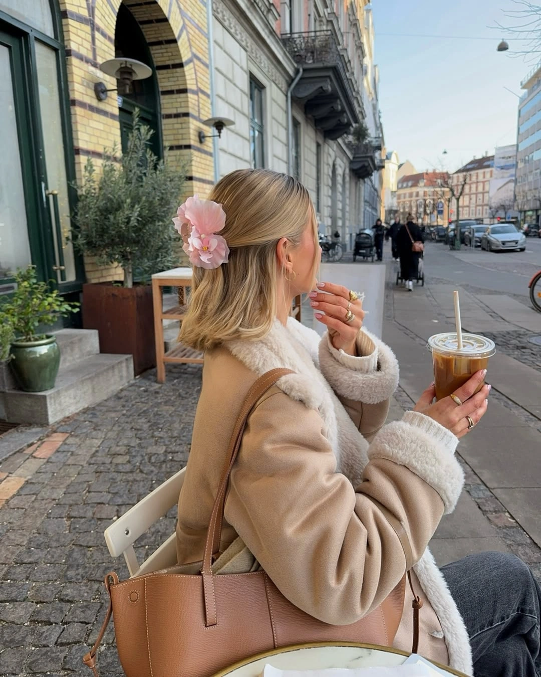 Fall hairstyles for office 2026 Soft Half-Up Bob With a Floral Accent for Creative Offices