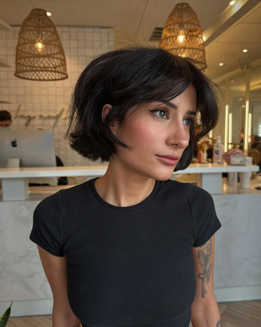 Fall hairstyles for short hair 2026 Voluminous Parisian Bob with Curtain Bangs
