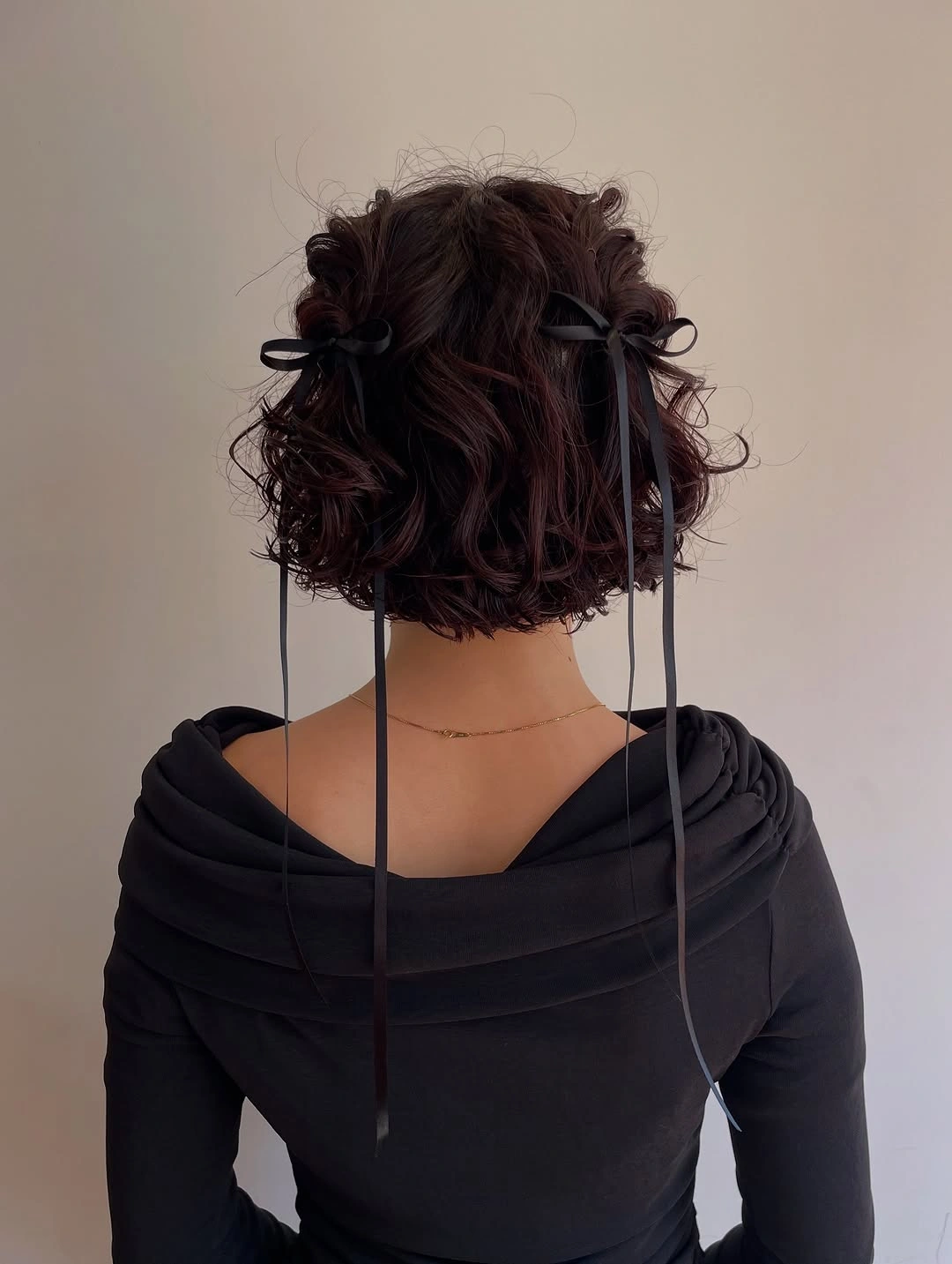 Fall hairstyles for short hair 2026 Playful Ribbon Curls for a Creative Fall Look