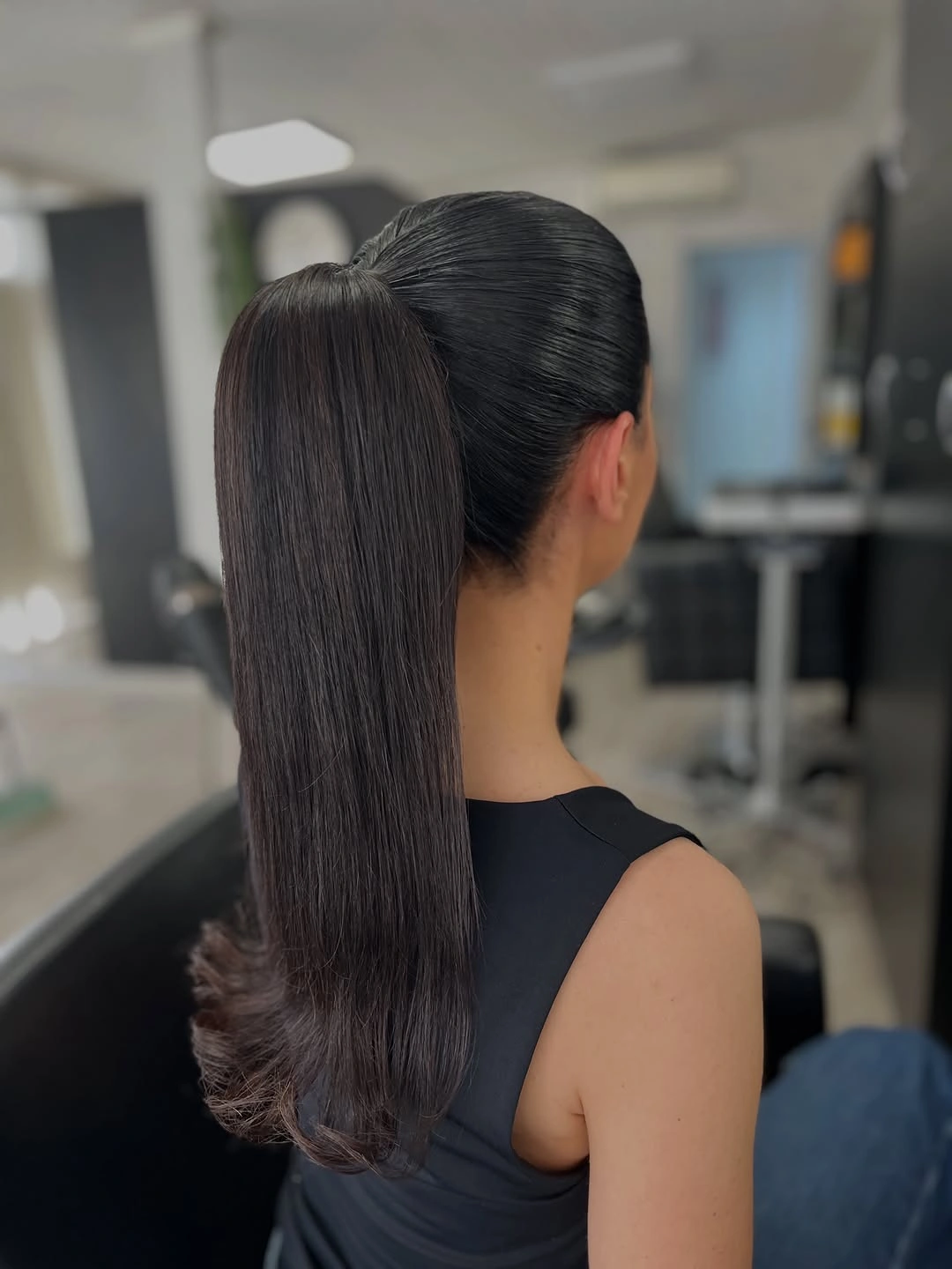 Fall hairstyles for wedding guests 2026 Ultra-Sleek High Ponytail for a Chic Black-Tie Wedding