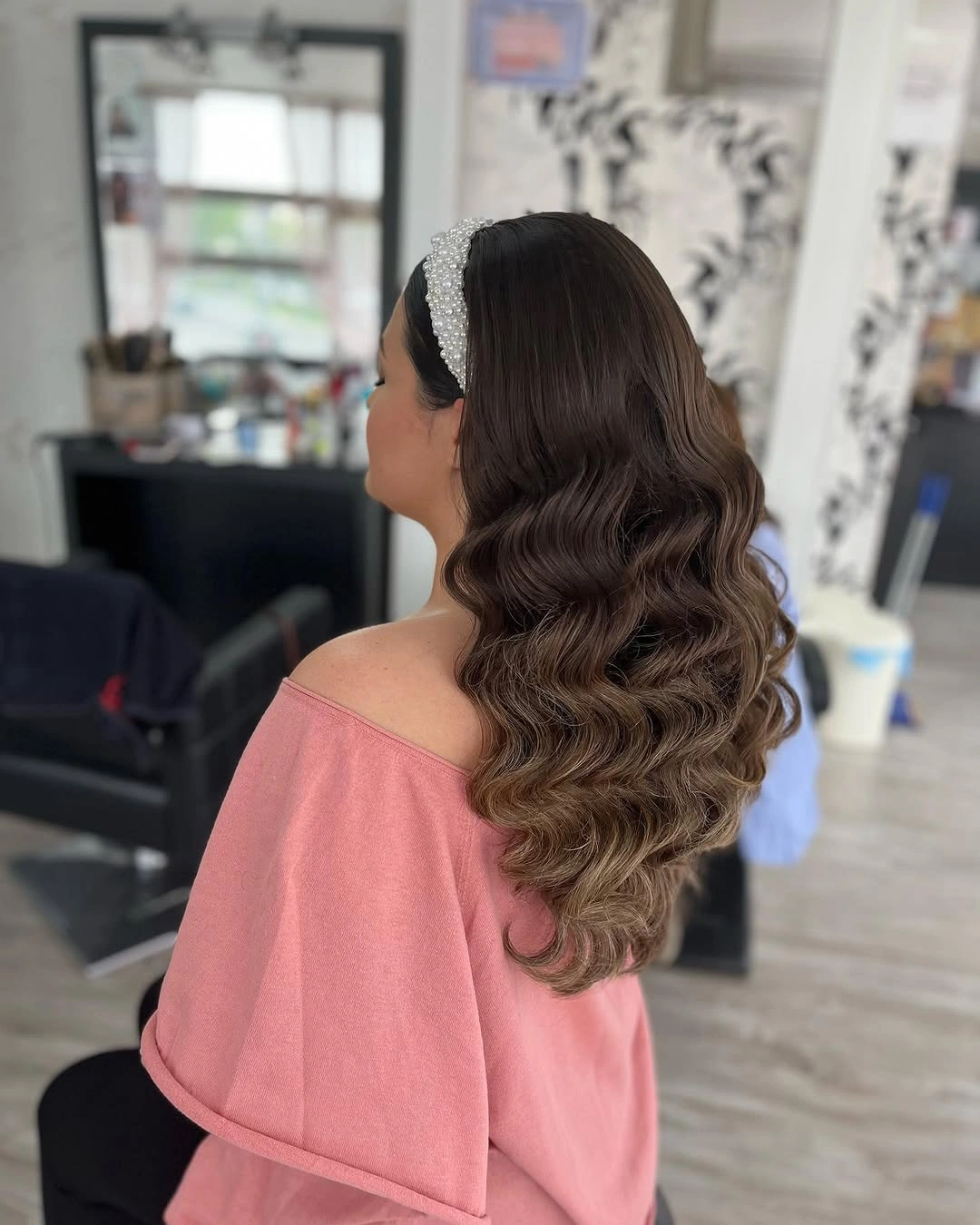 Fall hairstyles for wedding guests 2026 Hollywood Waves with a Pearl Headband for Romantic Elegance