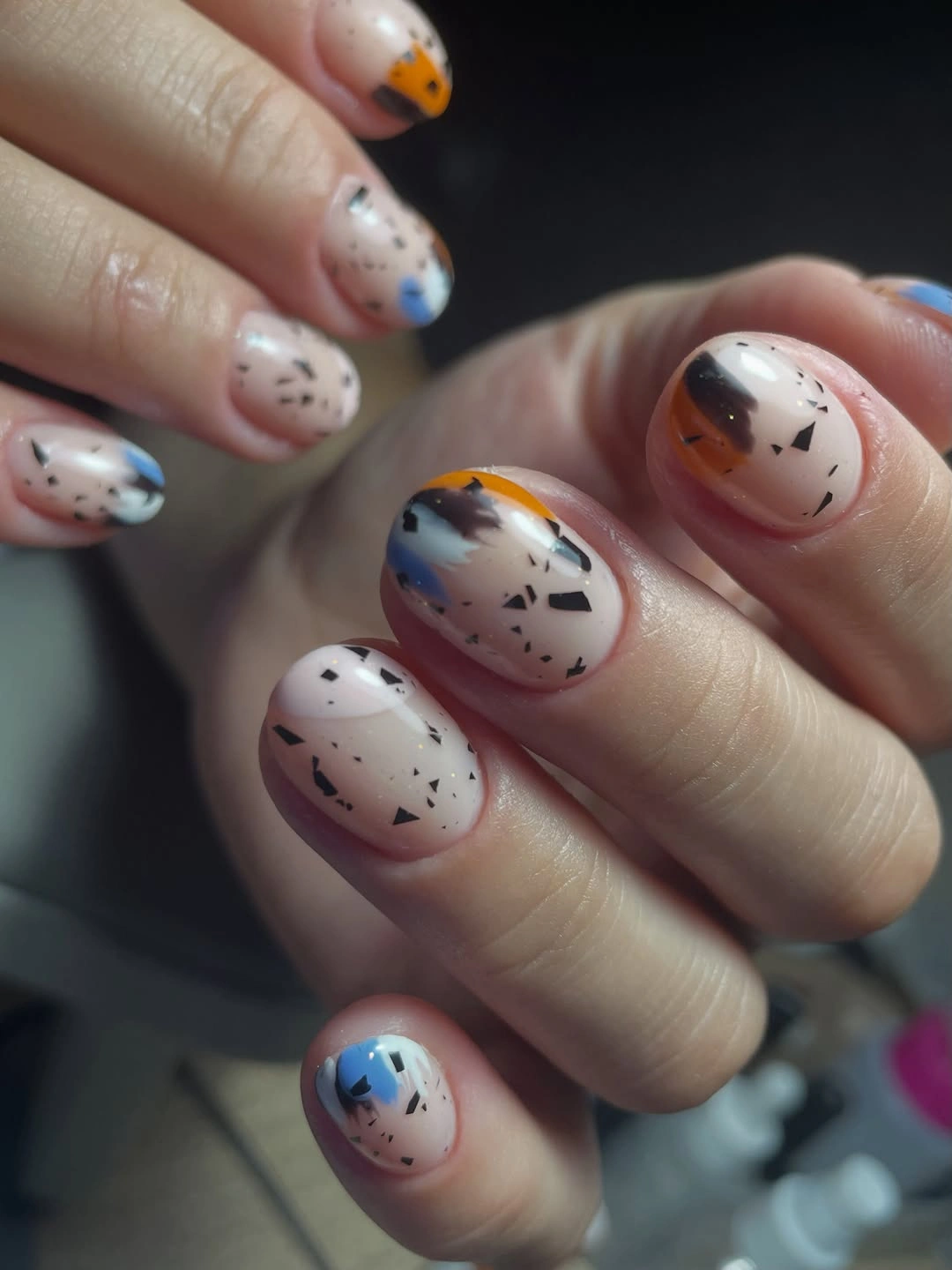 Fall manicure 2026 Nude Speckle Manicure With Color Patch Accents