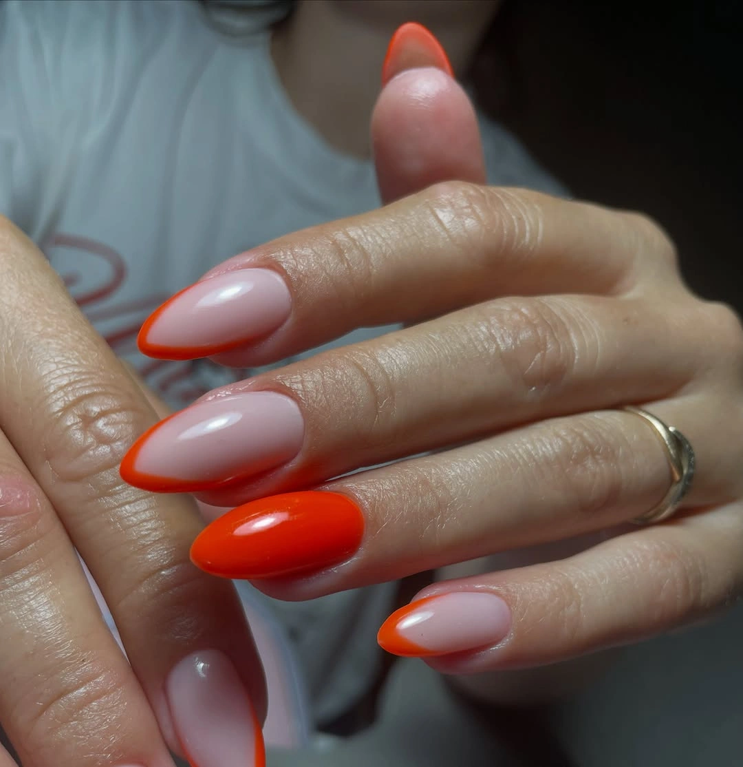 Fall manicure 2026 Orange French Almond Nails With Sheer Pink Centers