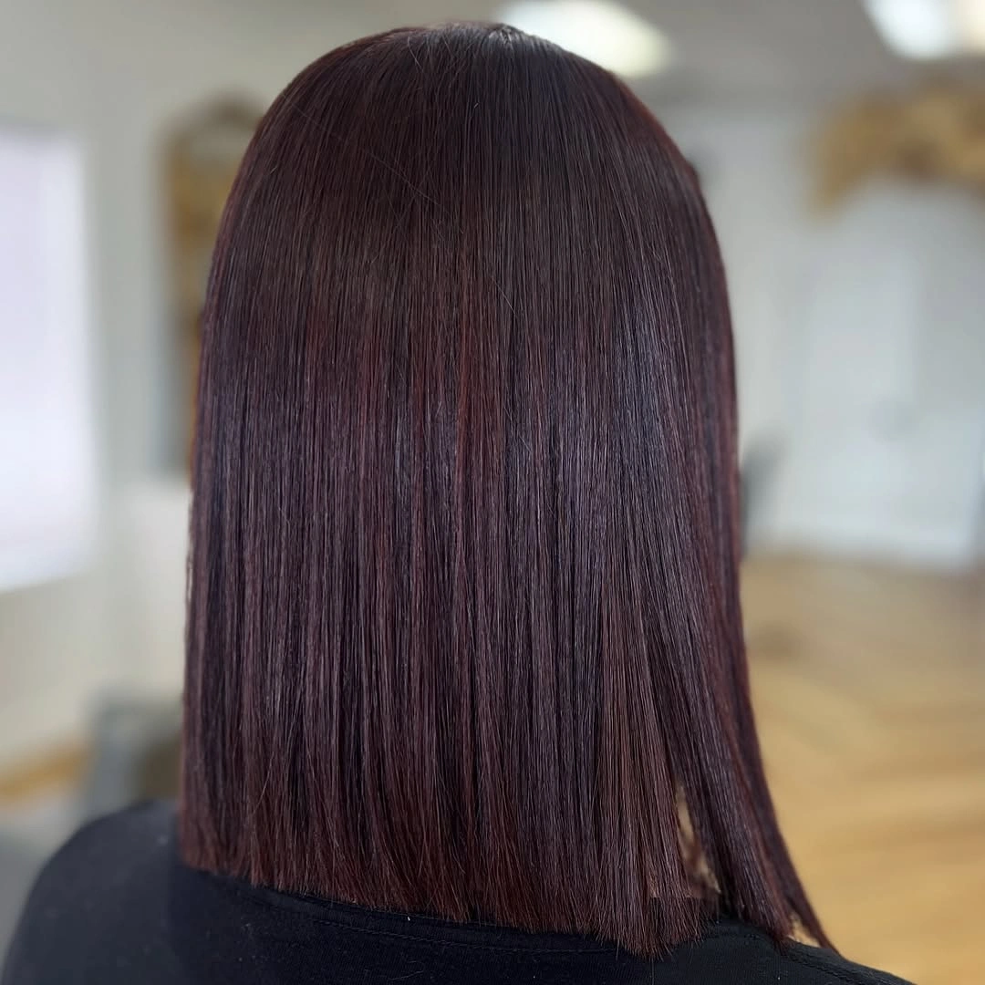 fall medium haircuts 2026 Ultra Sleek Espresso Blunt Cut With Glass Hair Finish