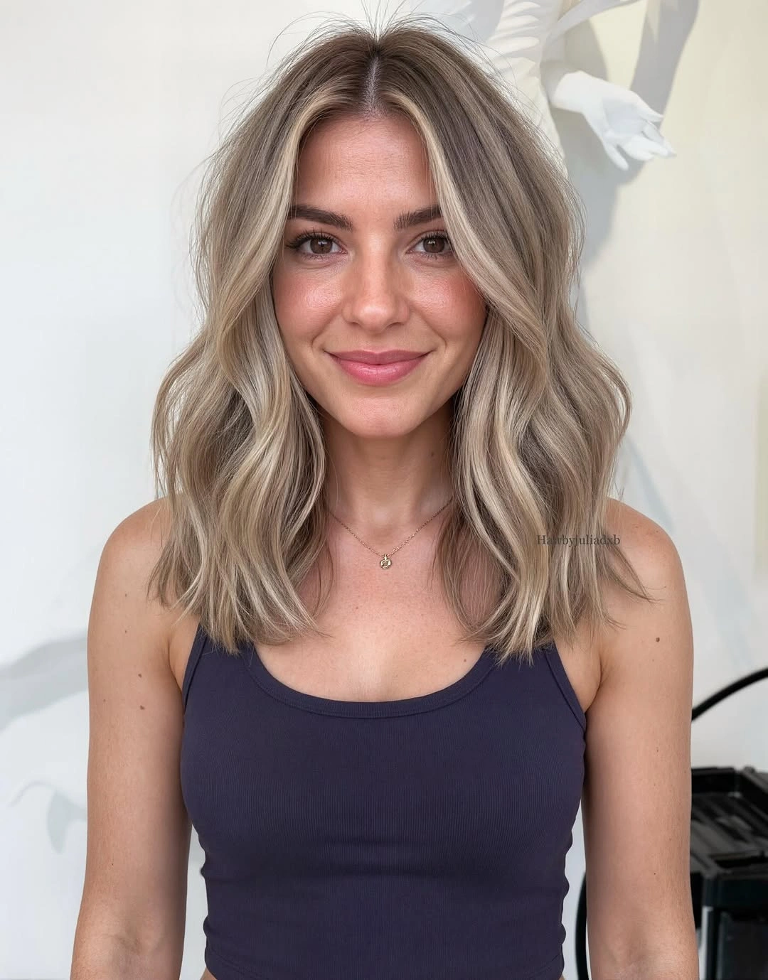 fall medium haircuts 2026 Bright Beige Blonde Lob With Soft Beachy Movement