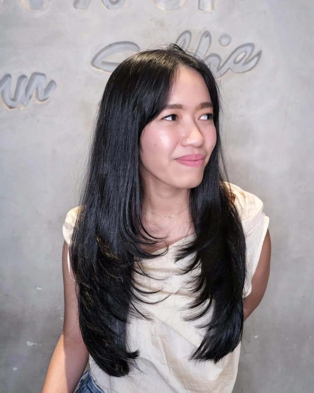 fall medium haircuts 2026 Long Sleek Layers With Flipped Ends