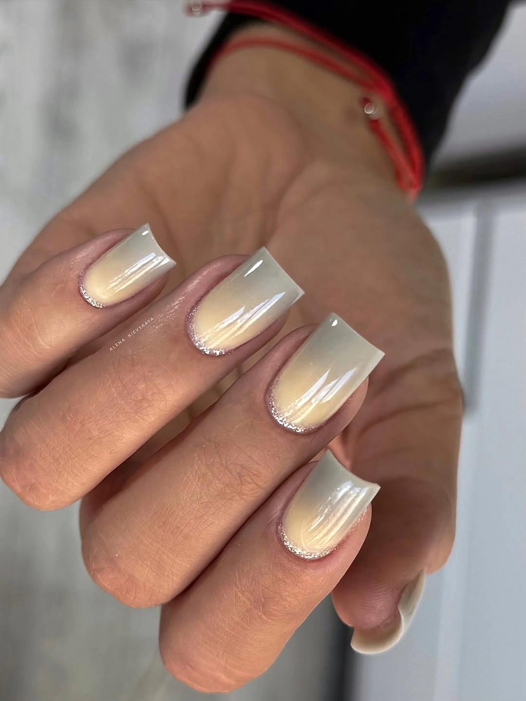 cream ombre coffin nails with silver cuticle sparkle