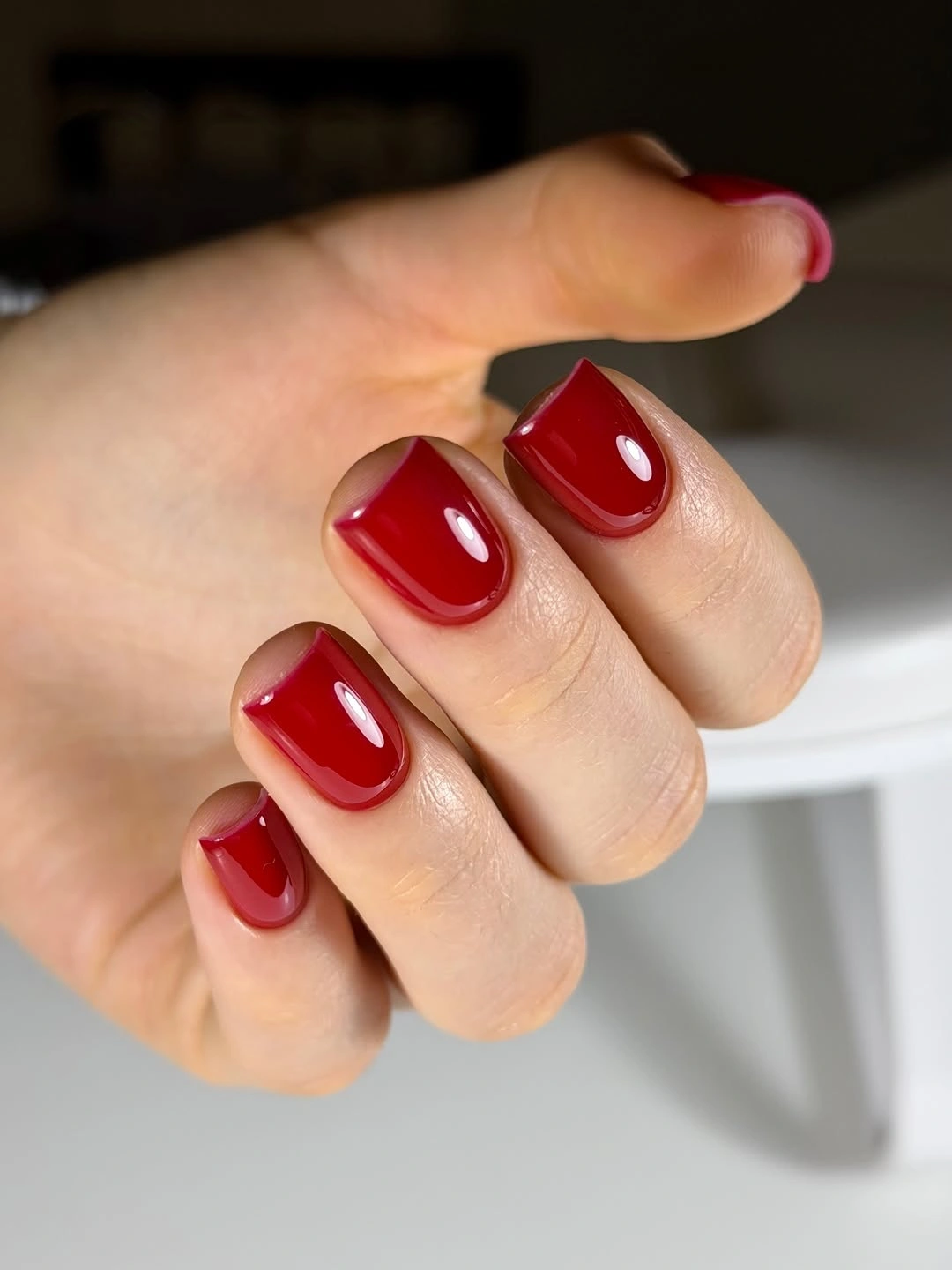 glossy cranberry square nails on medium-short length