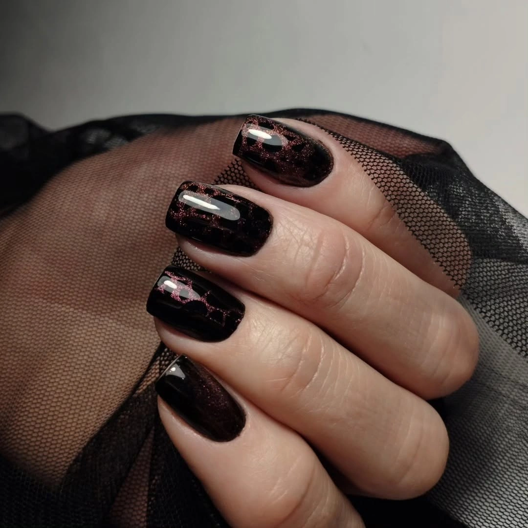 Fall nail art 2026 Black Gloss Nails With Tiny Red Accent Marks
