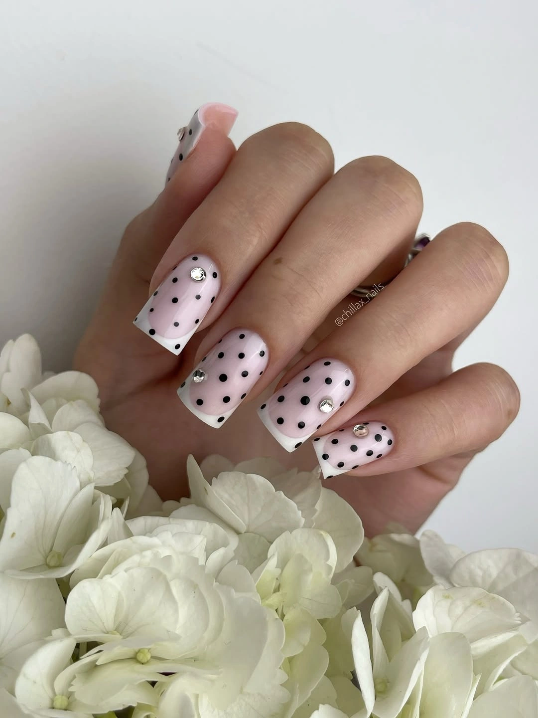 Fall nail art 2026 Pale Pink Nails With Black Polka Dots