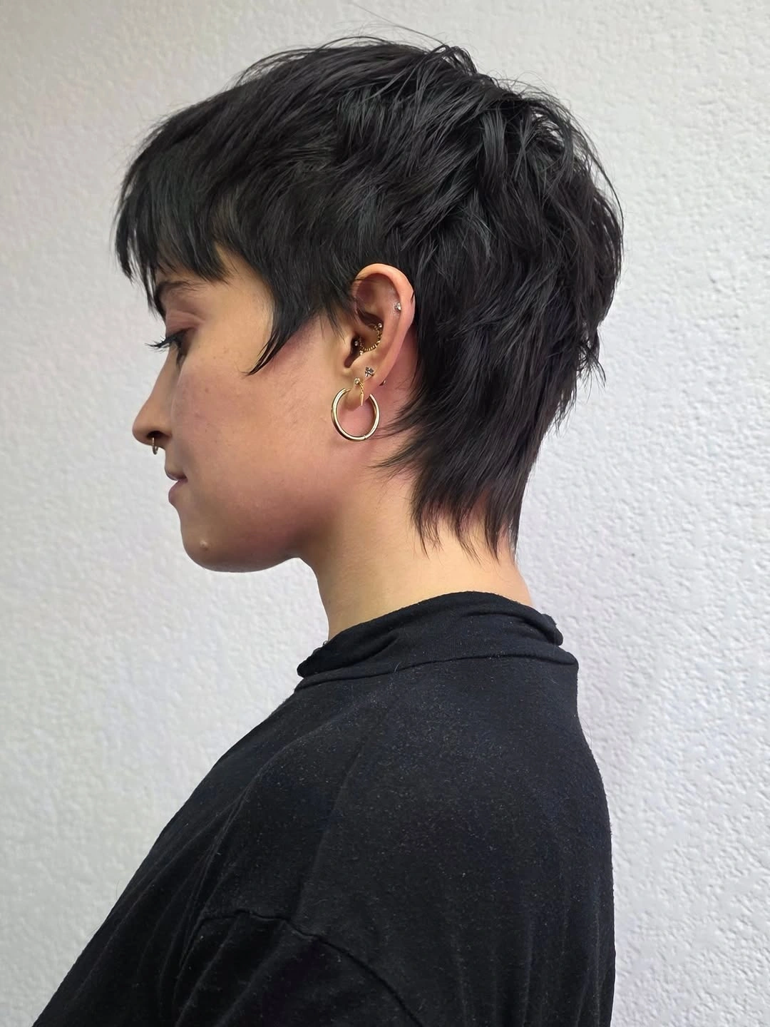 fall pixie haircut ideas 2026 Edgy Pixie Mullet with Textured Layers