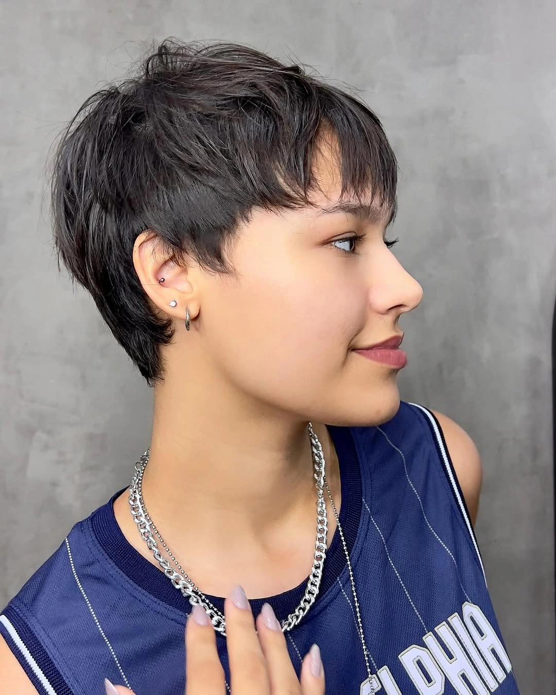 fall pixie haircut ideas 2026 Feathered Pixie with Wispy Fringe