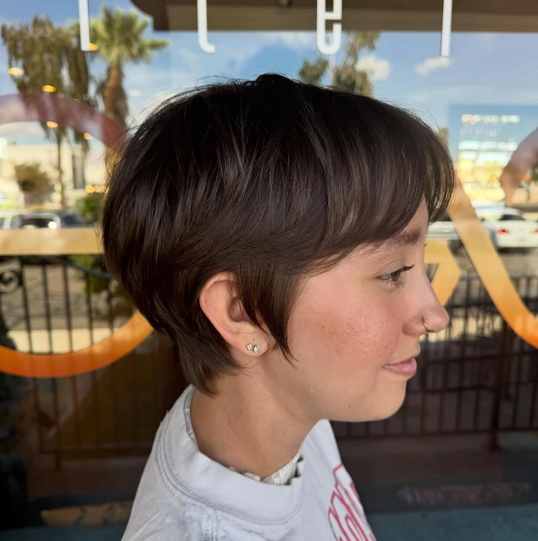 fall pixie haircut ideas 2026 Rounded Pixie with Curtain-Inspired Fringe