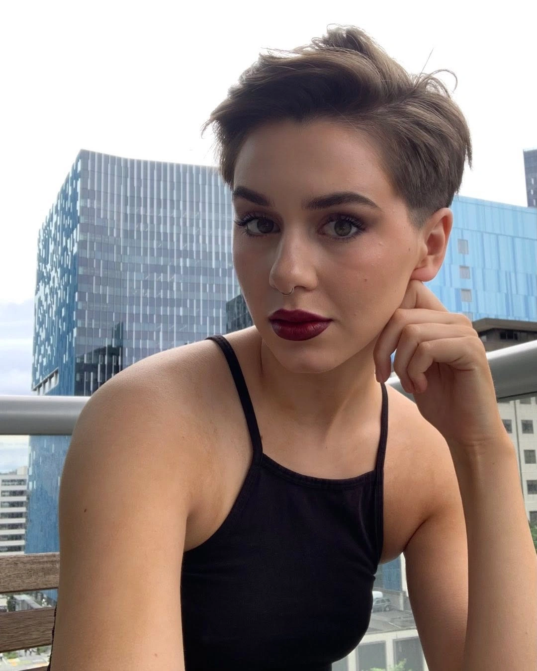 fall short haircuts 2026 Confident Textured Pixie With Long Crown Layers