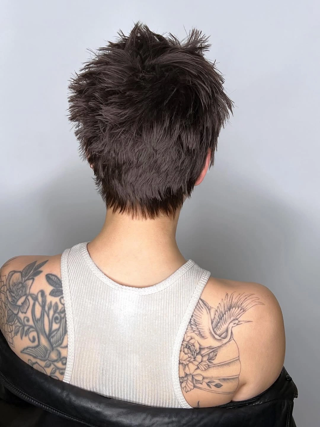 fall short haircuts 2026 Modern Feathered Pixie With Playful Texture