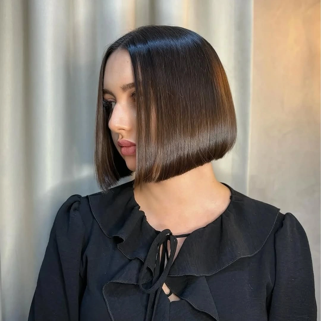 fall short haircuts 2026 Precision Glass Bob With Mirror Shine