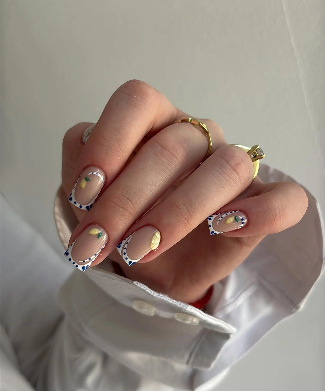 Fall short nails 2026 Pastel Short Nails With Dotted Border Accents