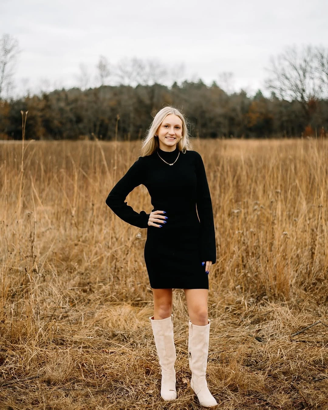 fall sweater dress outfits 2026 Black Sweater Dress With White Boots For A Chic Fall Contrast