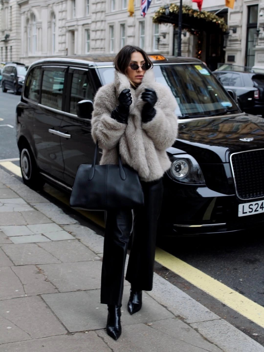 faux fur jacket Elegant Grey Faux Fur with Polished Black Winter Layers