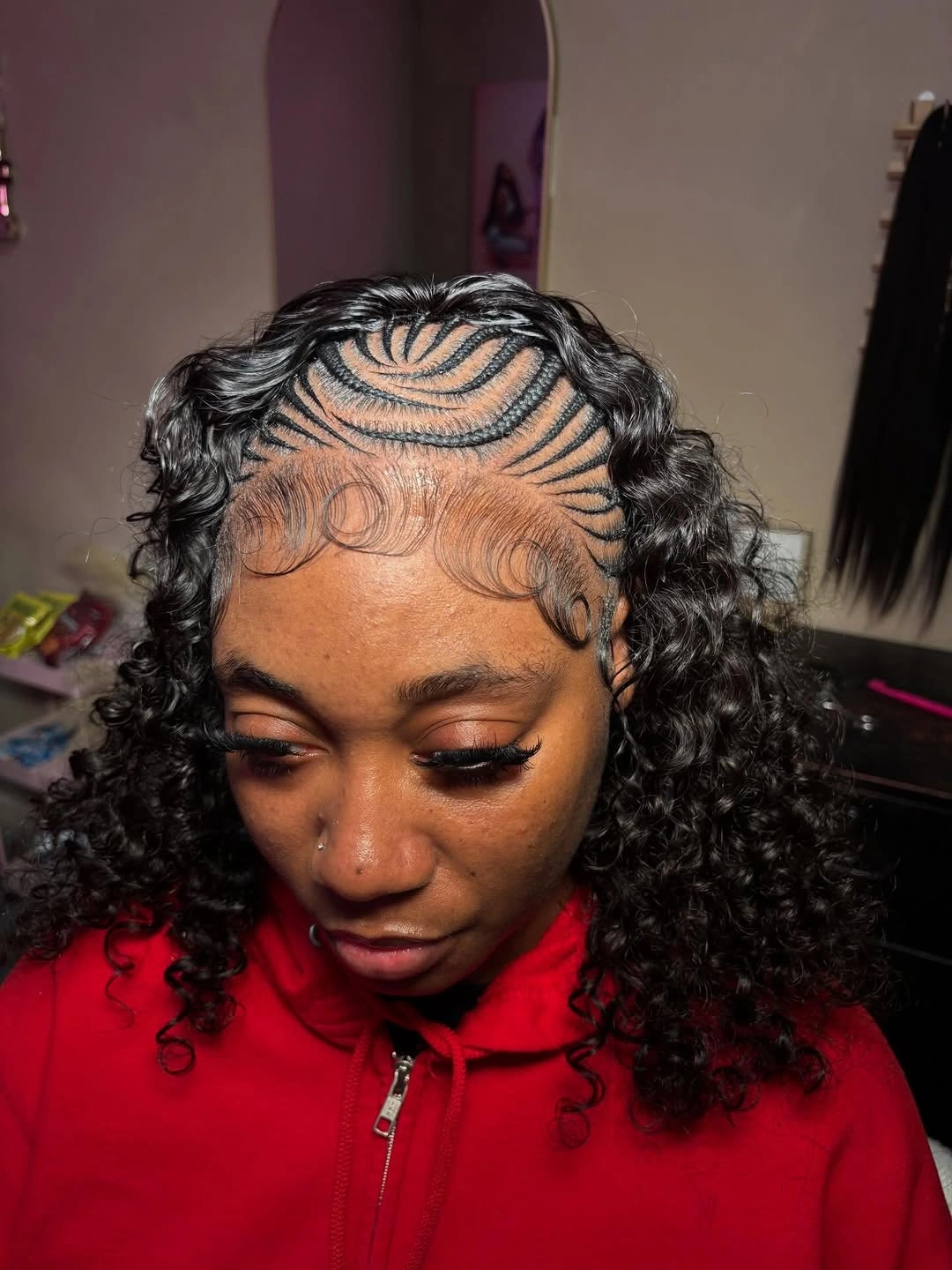 feed in braid hairstyles Curly Feed-In Braids with Dramatic Swirl Cornrows