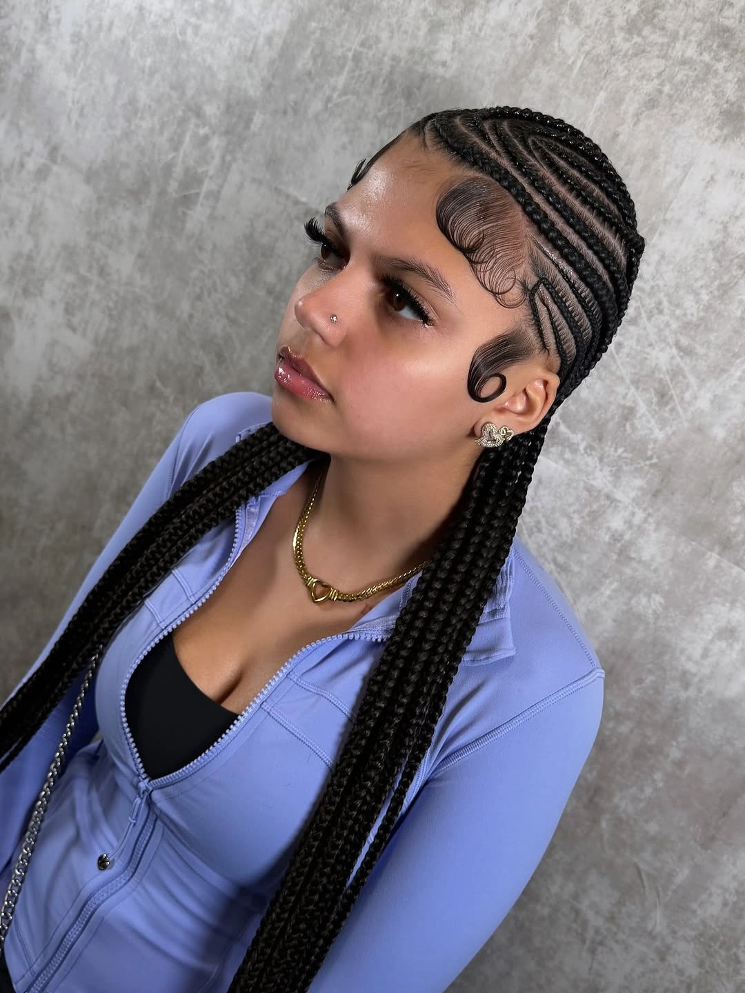 feed in braid hairstyles Long Straight-Back Feed-In Braids with Defined Edge Styling