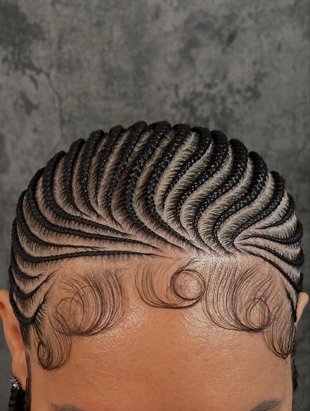 feed in braid hairstyles Micro Feed-In Cornrows with a Radiating Straight-Back Pattern