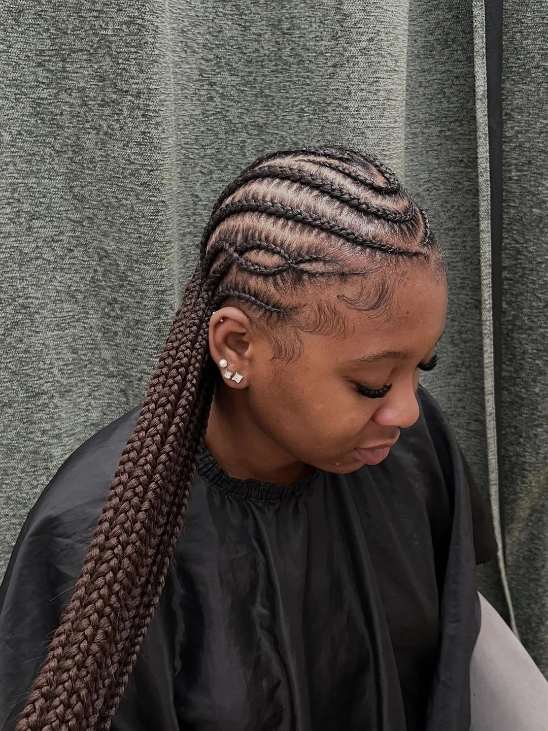 feed in braid hairstyles Extra-Long Side Feed-In Braids with Curved Cornrow Details