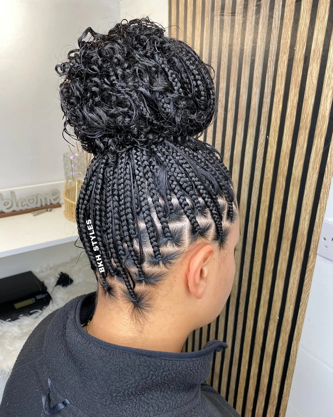 goddess braid High Goddess Braids Bun with Sculpted Cornrow Details