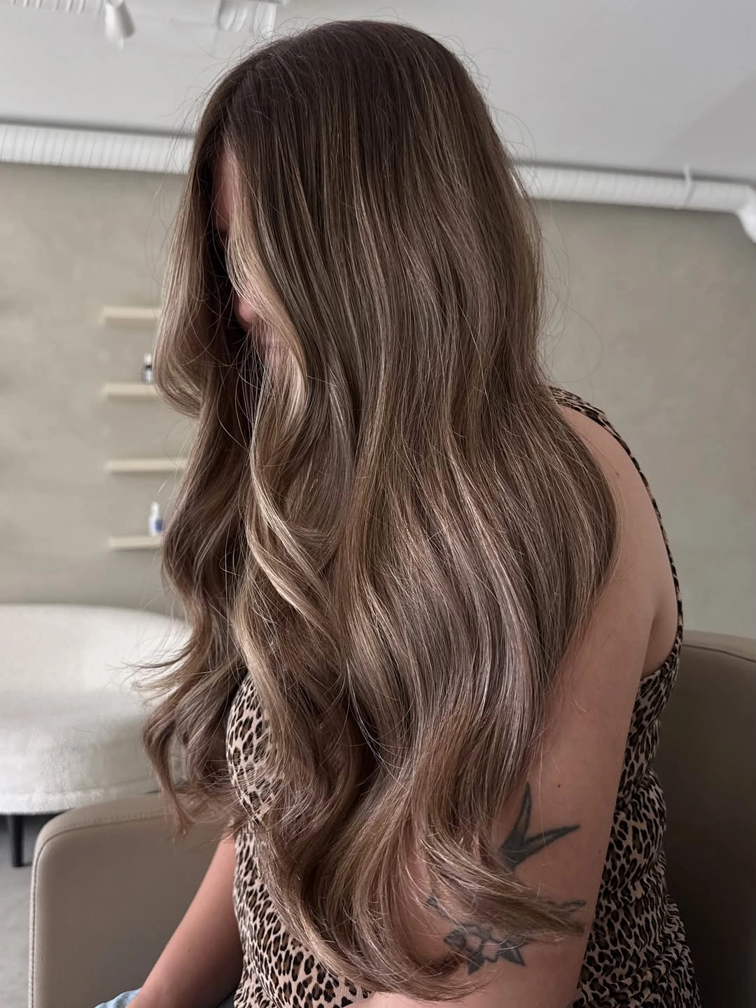 Hair Lowlights: Color Ideas and Inspiration Soft Espresso Waves with Face-Framing Lowlight Contrast