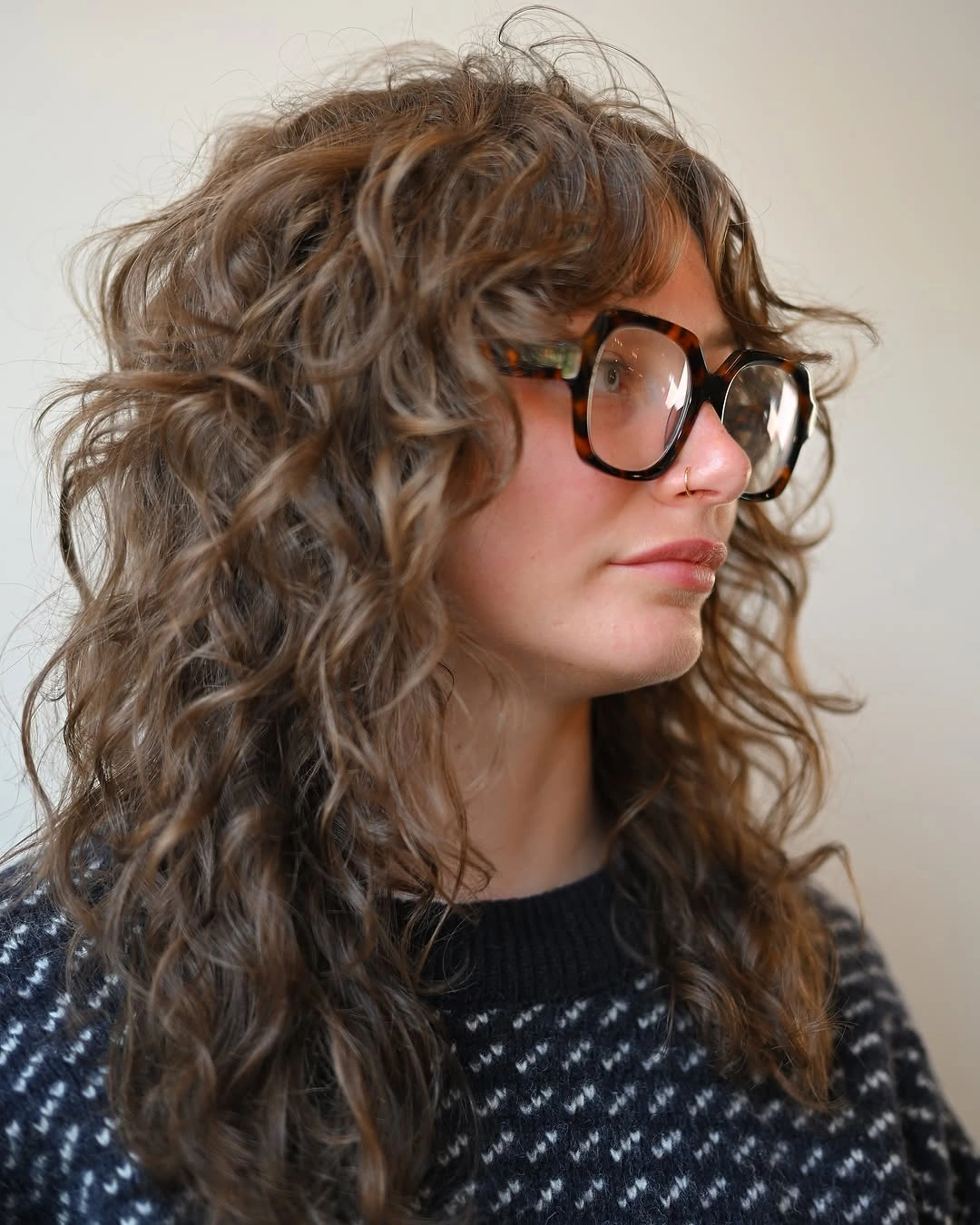 heatless curls hairstyle Natural Curly Shag With Wispy Bangs