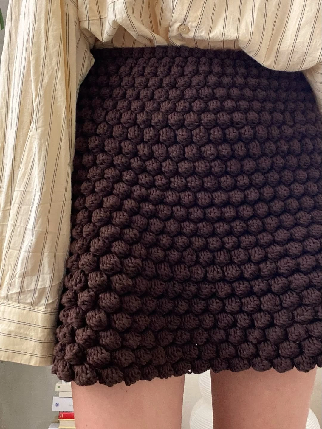knit skirt outfits fall 2026 Textured Brown Knit Mini Skirt With A Relaxed Shirt