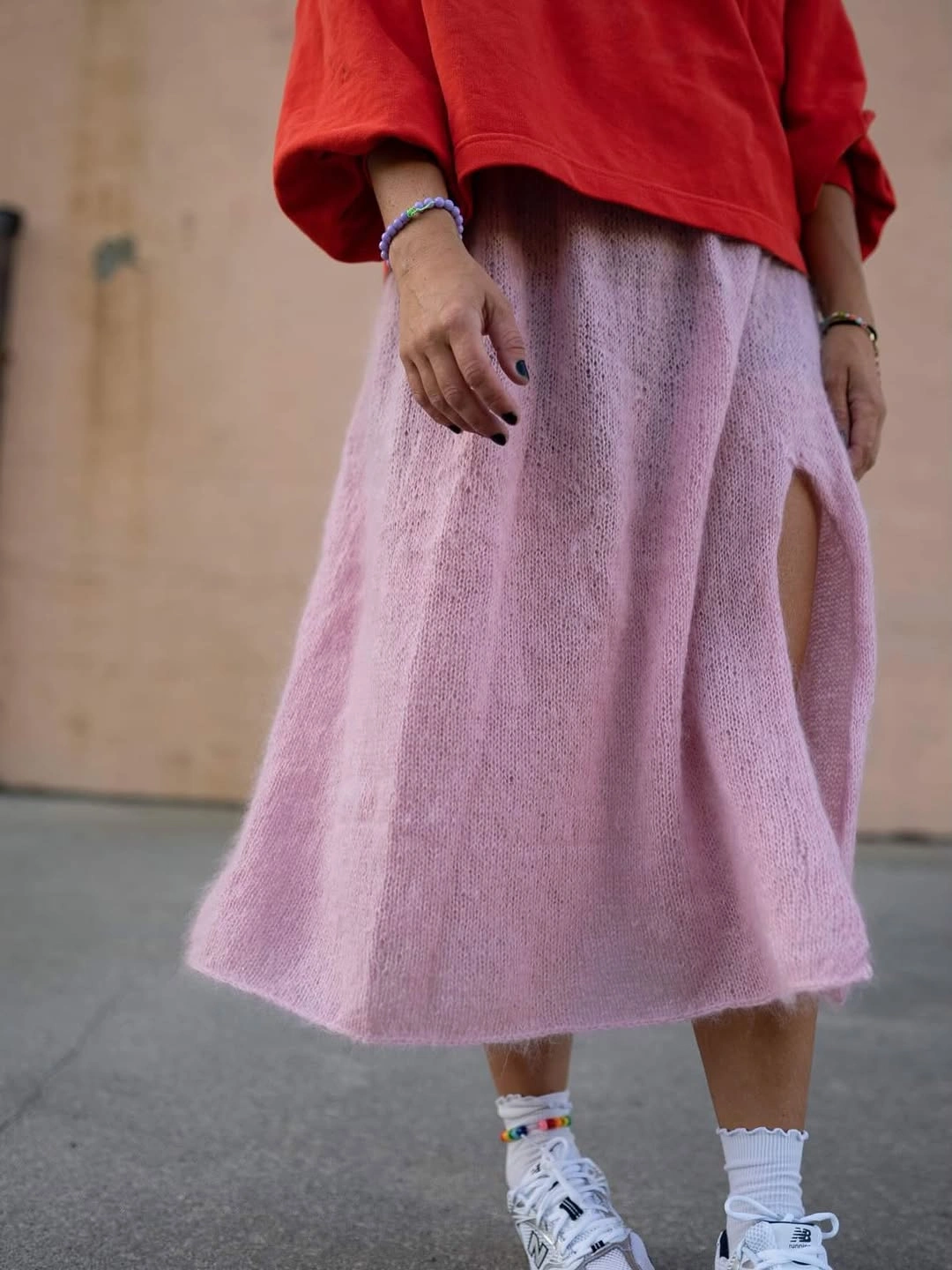 knit skirt outfits fall 2026 Pink Long Knit Skirt With A Relaxed Red Sweater