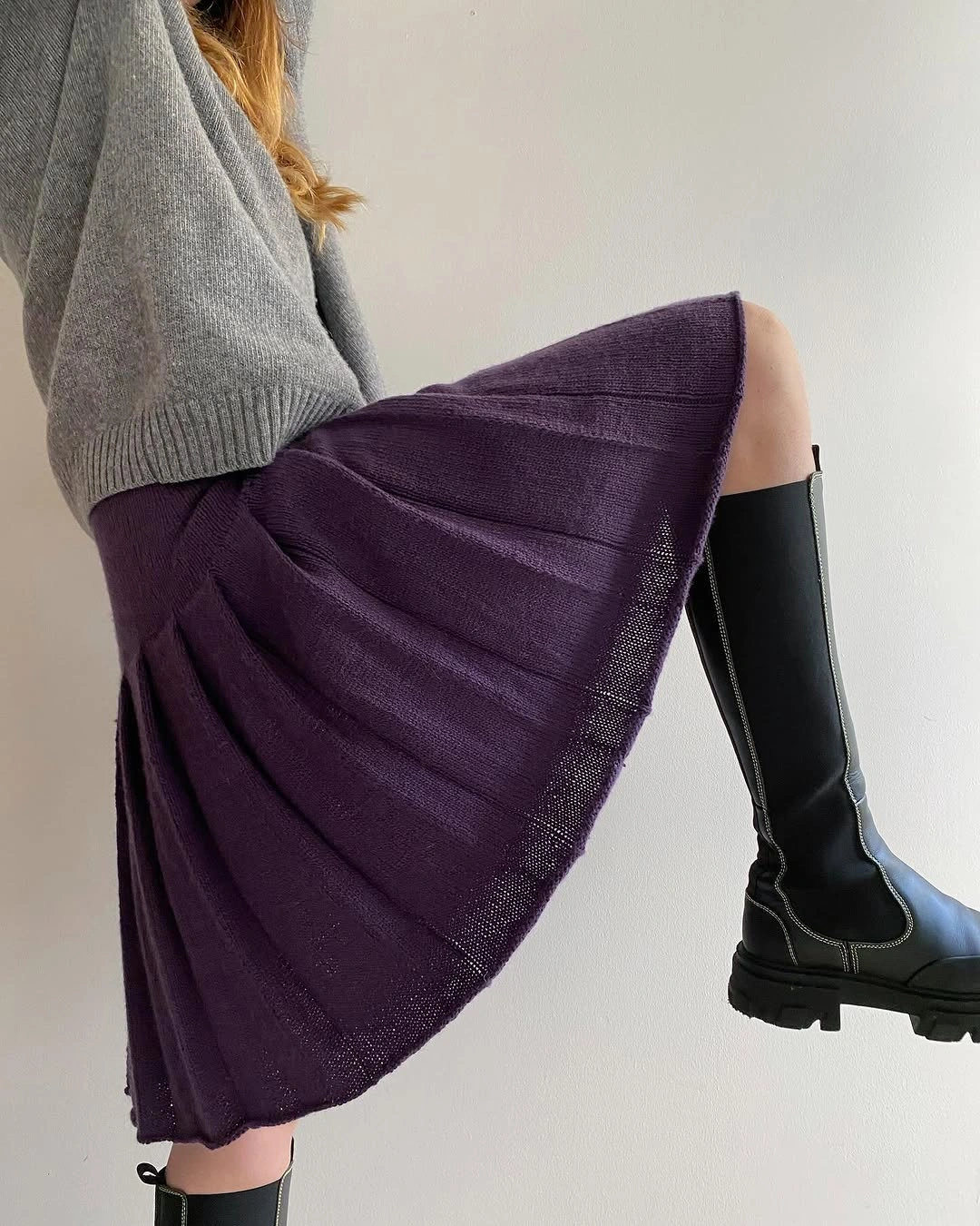 knit skirt outfits fall 2026 Purple Midi Knit Skirt Styled With A Relaxed Sweater