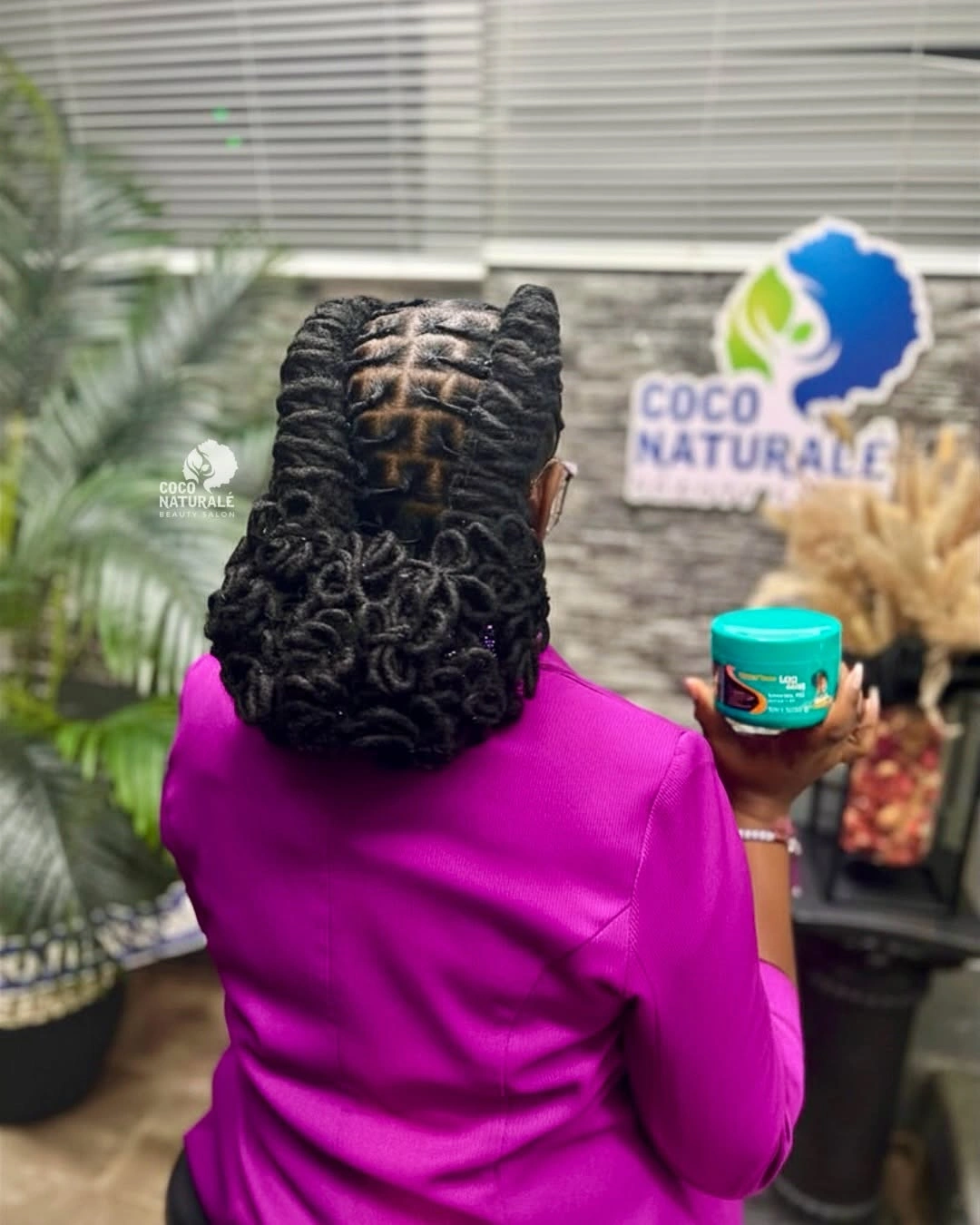 locs hairstyles for black women Elegant Floral Loc Updo for Special Occasions